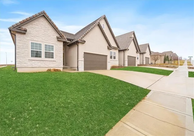 Photo 2 of Townhouse for sale at 718 Ne Algonquin St #A, Lees Summit, MO 64064 | MLS# 2584796 | Listing updated on 2026-09-13