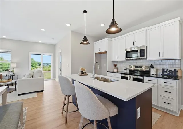 Photo 2 of Single family home for sale at 804 Glenn Cir, Raymore, MO 64083 | MLS# 2604825 | Listing updated on 2026-09-15