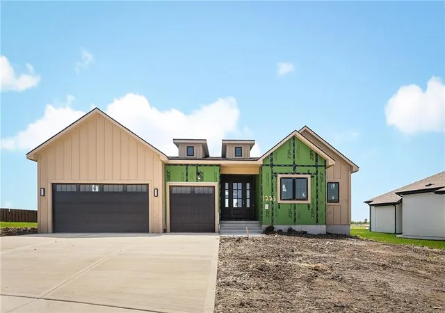 Single family home for sale at 1223 Larkspur Pl, Raymore, MO 64083 | MLS# 2623733