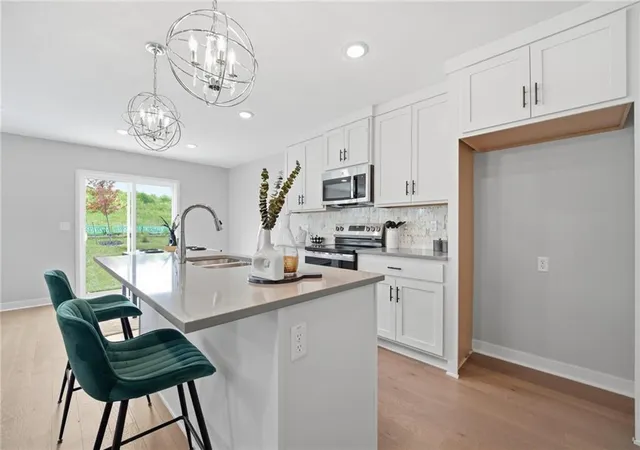 Photo 1 of Single family home for sale at 707 Glenn Cir, Raymore, MO 64083 | MLS# 2626609 | Listing updated on 2026-09-15