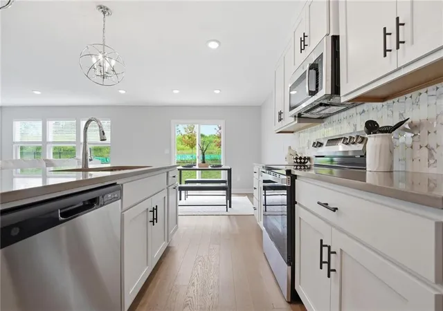 Photo 2 of Single family home for sale at 707 Glenn Cir, Raymore, MO 64083 | MLS# 2626609 | Listing updated on 2026-09-15