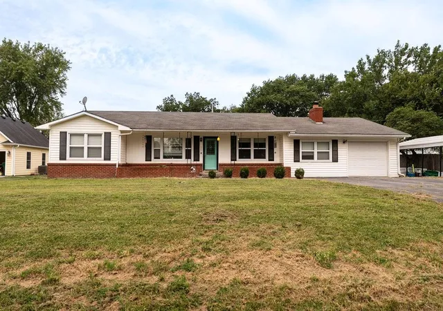 Single family home for sale at 404 S Texas St, Archie, MO 64725 | MLS# 2633122
