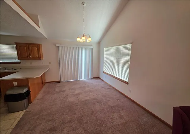 Photo 3 of Single family home for sale at 404 Blue Grass Dr, Raymore, MO 64083 | MLS# 2634042 | Listing updated on 2026-09-22