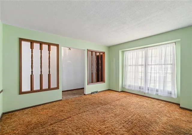 Photo 3 of Single family home for sale at 7923 Oakland Ave, Kansas City, KS 66112 | MLS# 2635691 | Listing updated on 2026-09-11