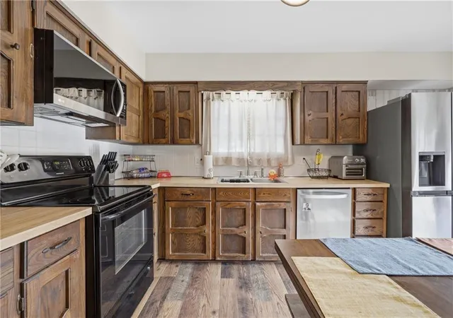 Photo 3 of Single family home for sale at 203 SE 16th Street, Oak Grove, MO 64075 | MLS# 2636230 | Listing updated on 2026-09-14