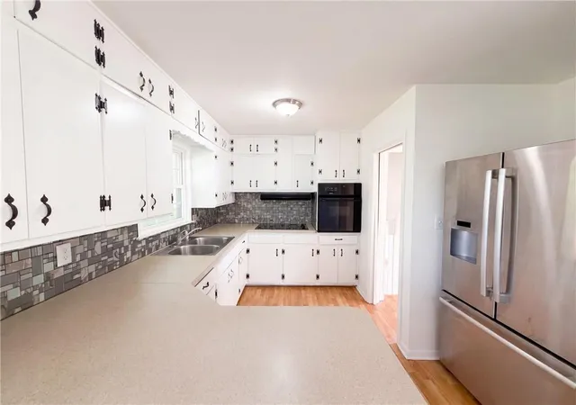 Photo 2 of Single family home for sale at 12904 E 54th Street, Kansas City, MO 64133 | MLS# 2637289 | Listing updated on 2026-10-09