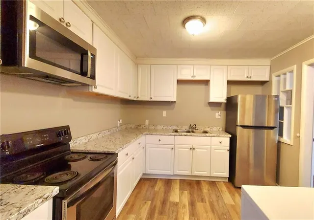 Photo 4 of Single family home for sale at 419 W 5th Street, Pittsburg, KS 66762 | MLS# 2637745 | Listing updated on 2026-10-29