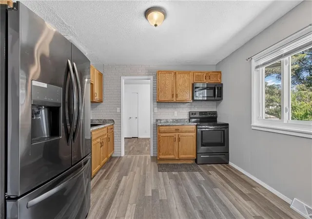 Photo 4 of Single family home for sale at 11415 Myrtle Ave, Kansas City, MO 64137 | MLS# 2639521 | Listing updated on 2026-09-13