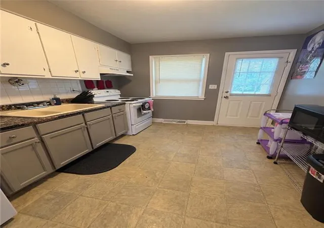 Photo 3 of Multi family home for sale at 1427 Oakley Ave, Kansas City, MO 64127 | MLS# 2640467 | Listing updated on 2026-09-09
