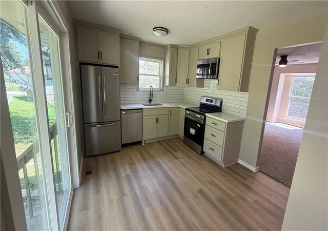 Photo 2 of Multi family home for sale at 8132 8134 N Stoddard Ave, Kansas City, MO 64152 | MLS# 2641722 | Listing updated on 2026-09-15