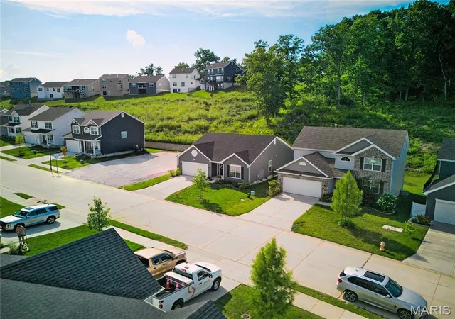 Photo 2 of Single family home for sale at 1207 Winding Bluffs Wy, Fenton, MO 63026 | MLS# MIS26044935 | Listing updated on 2026-09-11