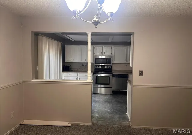 Photo 4 of Townhouse for sale at 129 Carmel Woods Dr, Ellisville, MO 63021 | MLS# MIS26047266 | Listing updated on 2026-09-12