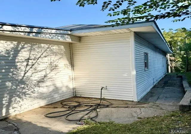 Photo 4 of Single family home for sale at 411 Smith St, Hannibal, MO 63401 | MLS# MIS26056276 | Listing updated on 2026-09-11