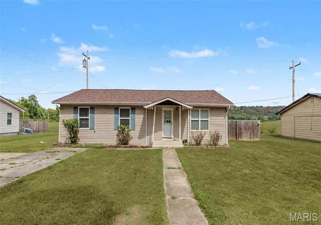 Single family home for sale at 209 Dyer St, Waynesville, MO 65583 | MLS# MIS26056707