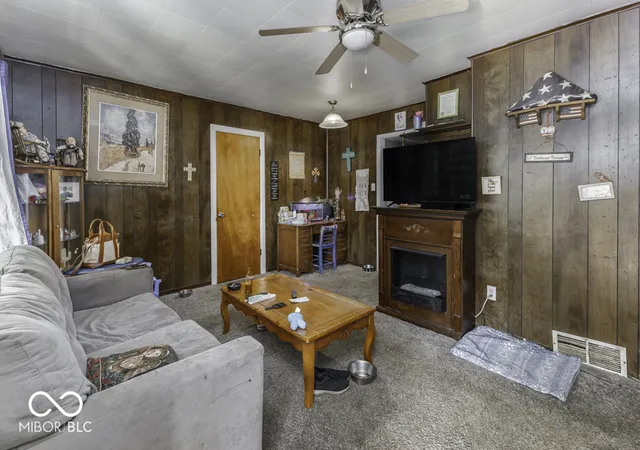 Photo 4 of Single family home for sale at 719 Melvenia St, Indianapolis, IN 46219 | MLS# 22042383 | Listing updated on 2026-09-10
