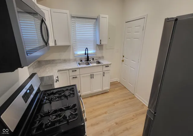 Photo 4 of House for sale at 2141 Bellefontaine St, Indianapolis, IN 46202 | MLS# 22100600 | Listing updated on 2026-09-15