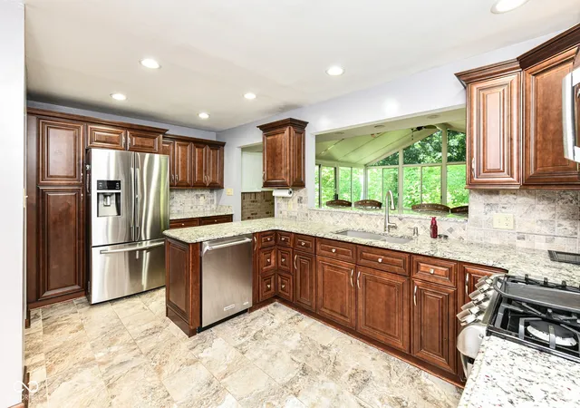 Photo 3 of Single family home for sale at 7011 Wildridge Dr, Indianapolis, IN 46256 | MLS# 22105739 | Listing updated on 2026-09-11