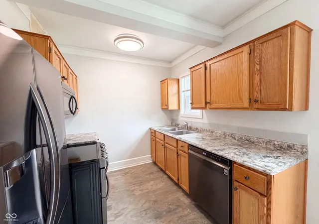Photo 2 of Single family home for sale at 1510 E Raymond St, Indianapolis, IN 46203 | MLS# 22109697 | Listing updated on 2026-10-02