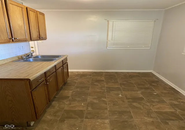 Photo 3 of Single family home for sale at 5778 E 30th Street, Indianapolis, IN 46218 | MLS# 22123533 | Listing updated on 2026-09-10