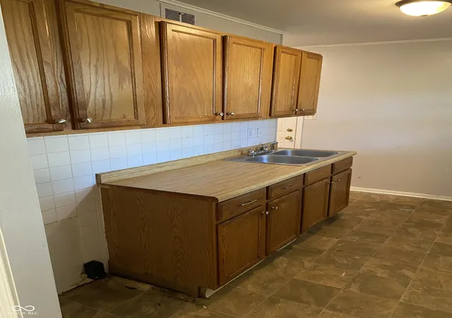 Photo 4 of Single family home for sale at 5778 E 30th Street, Indianapolis, IN 46218 | MLS# 22123533 | Listing updated on 2026-09-10
