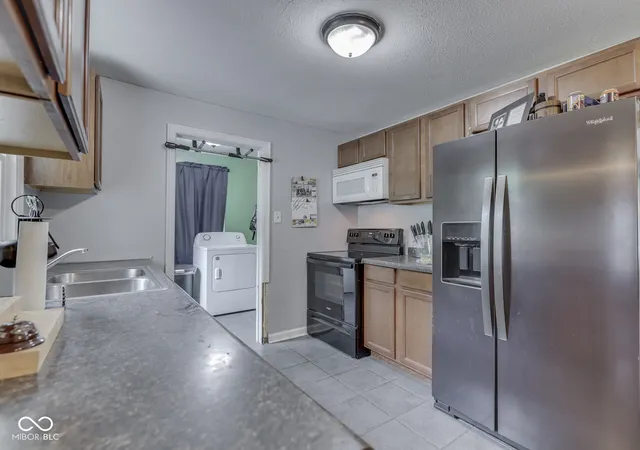 Photo 4 of Single family home for sale at 1603 S Morgantown Rd, Greenwood, IN 46143 | MLS# 22124964 | Listing updated on 2026-09-12