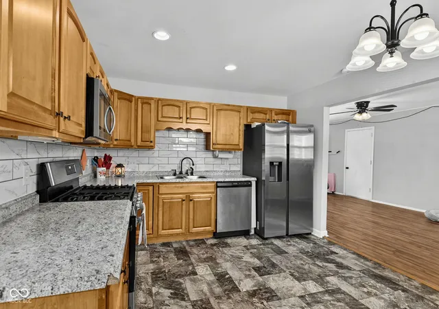 Photo 4 of Single family home for sale at 602 S Mitchner Ave, Indianapolis, IN 46239 | MLS# 22125569 | Listing updated on 2026-10-26