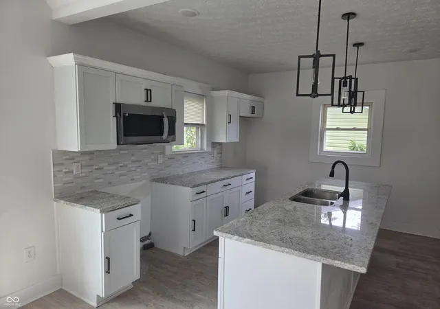 Photo 4 of Single family home for sale at 408 N Forest Ave, Indianapolis, IN 46201 | MLS# 22125570 | Listing updated on 2026-10-02