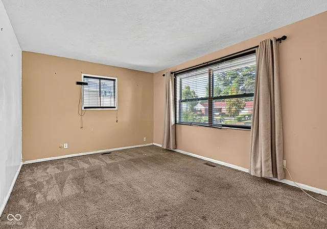 Photo 4 of Sale Pending at 3233 N Arsenal Ave, Indianapolis, IN 46218 | MLS# 22125891 | Listing updated on 2026-10-12