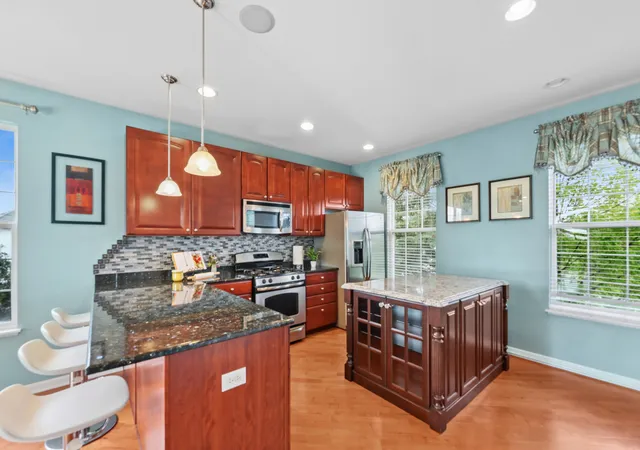 Photo 2 of Townhouse for sale at 1009 Alberta Rd, Elgin, IL 60124 | MLS# 12653257 | Listing updated on 2026-09-25