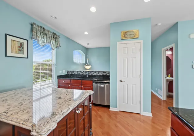 Photo 3 of Townhouse for sale at 1009 Alberta Rd, Elgin, IL 60124 | MLS# 12653257 | Listing updated on 2026-09-25