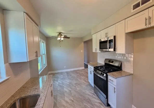 Photo 3 of Single family home for sale at 14504 Kenwood Ave, Dolton, IL 60419 | MLS# 12707823 | Listing updated on 2026-09-14