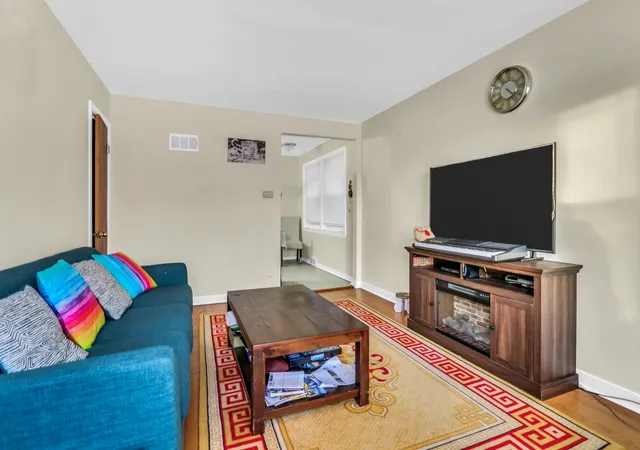 Photo 3 of Multi family home for sale at 4956 Louise St, Skokie, IL 60077 | MLS# 12724739 | Listing updated on 2026-09-11