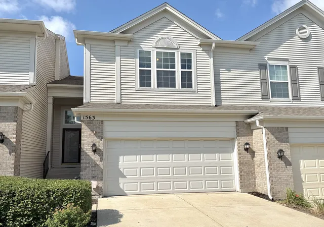 Photo 1 of Townhouse for sale at 1563 Yellowstone Dr, Streamwood, IL 60107 | MLS# 12727946 | Listing updated on 2026-09-15