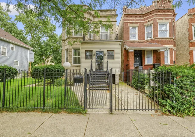 Photo 1 of Multi family home for sale at 34 N Lockwood Ave, Chicago, IL 60644 | MLS# 12729778 | Listing updated on 2026-09-30