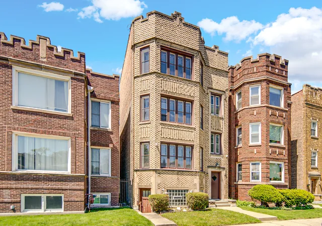 Photo 2 of Multi family home for sale at 7428 S Bennett Ave, Chicago, IL 60649 | MLS# 12729819 | Listing updated on 2026-09-30