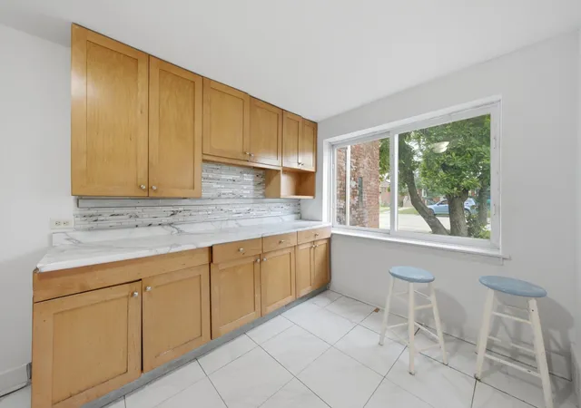 Photo 4 of Single family home for sale at 14432 S Normal Ave, Riverdale, IL 60827 | MLS# 12738437 | Listing updated on 2026-09-24