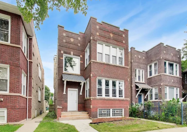 Photo 1 of Multi family home for sale at 1051 N Massasoit Ave, Chicago, IL 60651 | MLS# 12748816 | Listing updated on 2026-09-15