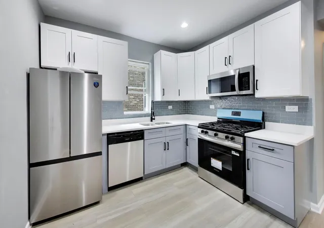 Photo 4 of Multi family home for sale at 1051 N Massasoit Ave, Chicago, IL 60651 | MLS# 12748816 | Listing updated on 2026-09-15