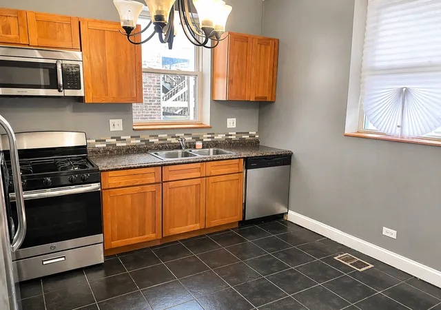 Photo 3 of Condo for sale at 122 E 49th Street #106, Chicago, IL 60615 | MLS# 12752466 | Listing updated on 2026-09-11