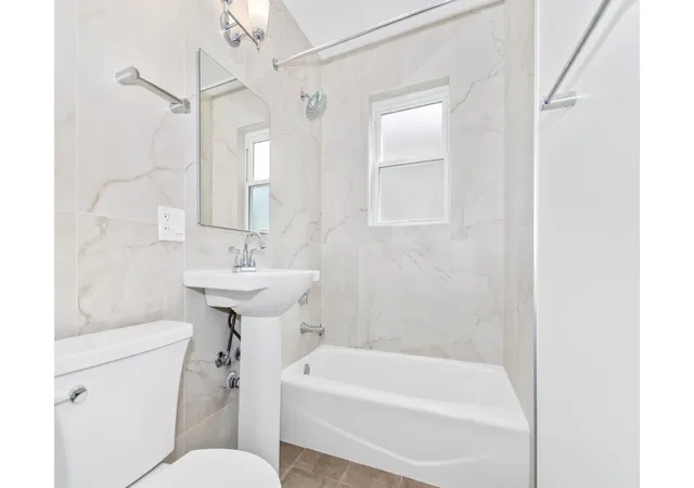 Photo 3 of Multi family home for sale at 8914 Lamon Ave, Skokie, IL 60077 | MLS# 12752626 | Listing updated on 2026-09-11