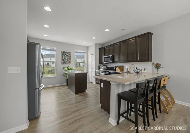 Photo 3 of Townhouse for sale at 1491 Deer Pointe Dr, South Elgin, IL 60177 | MLS# 12753843 | Listing updated on 2026-09-18