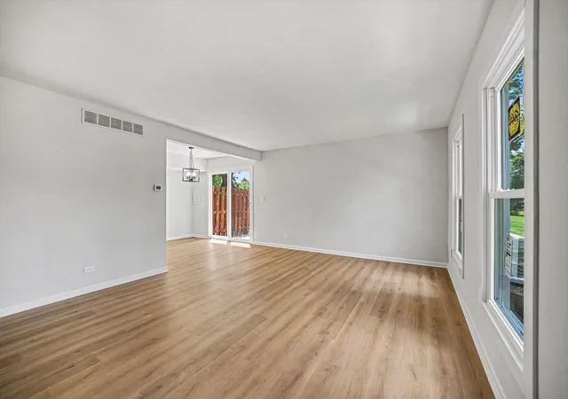 Photo 3 of Townhouse for sale at 1801 Jamestown Cir, Hoffman Estates, IL 60169 | MLS# 12754720 | Listing updated on 2026-09-24