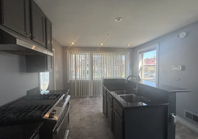 Photo 3 of Sale Pending at 214 22nd Avenue, Bellwood, IL 60104 | MLS# 12755158 | Listing updated on 2026-09-14