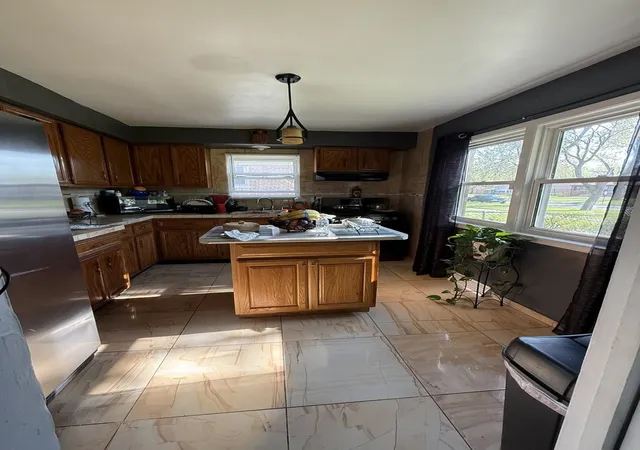Photo 3 of Single family home for sale at 15001 Western Ave, Harvey, IL 60426 | MLS# 12759485 | Listing updated on 2026-09-14