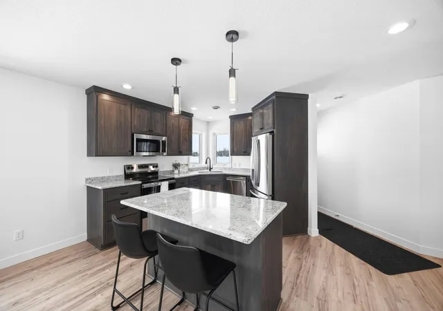 Photo 2 of Townhouse for sale at 254 Eau Claire Ave Se, Hutchinson, MN 55350 | MLS# 6784423 | Listing updated on 2026-09-10