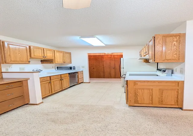 Photo 2 of Condo for sale at 1200 18th Avenue Nw #118, Austin, MN 55912 | MLS# 7007233 | Listing updated on 2026-09-14