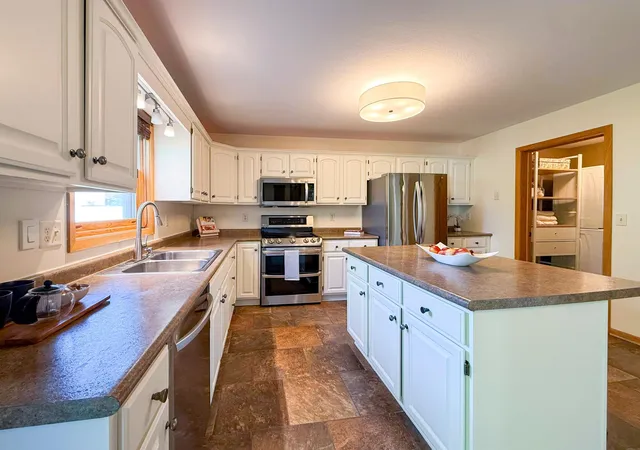 Photo 3 of Single family home for sale at 411 Waterview Ln Nw, Rochester, MN 55901 | MLS# 7106766 | Listing updated on 2026-09-15