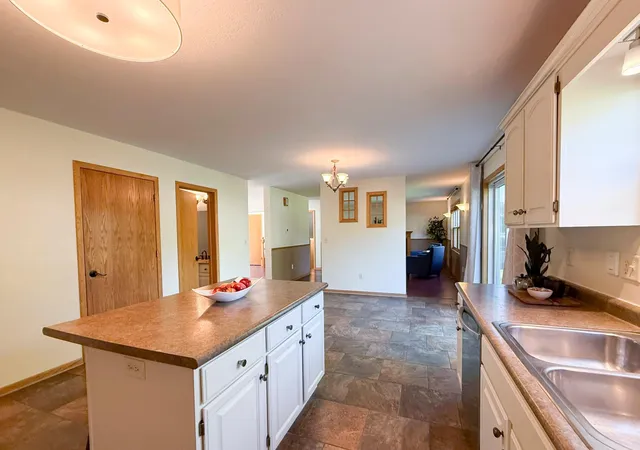 Photo 4 of Single family home for sale at 411 Waterview Ln NW, Rochester, MN 55901 | MLS# 7106766 | Listing updated on 2026-09-15