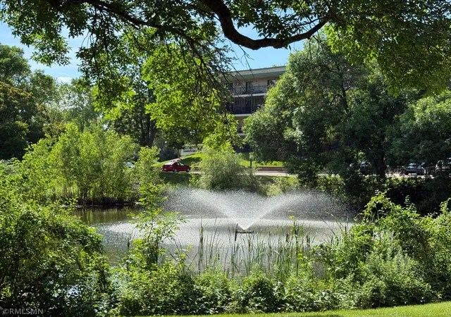 Listing Photo 1 - Condo for sale in building located at 10511 Cedar Lake Rd, Minnetonka, MN 55305 - Unit #309