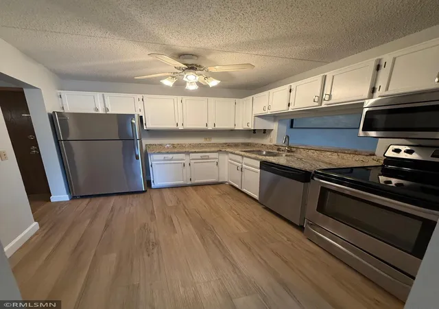 Listing Photo 3 - Condo for sale in building located at 10511 Cedar Lake Rd, Minnetonka, MN 55305 - Unit #309